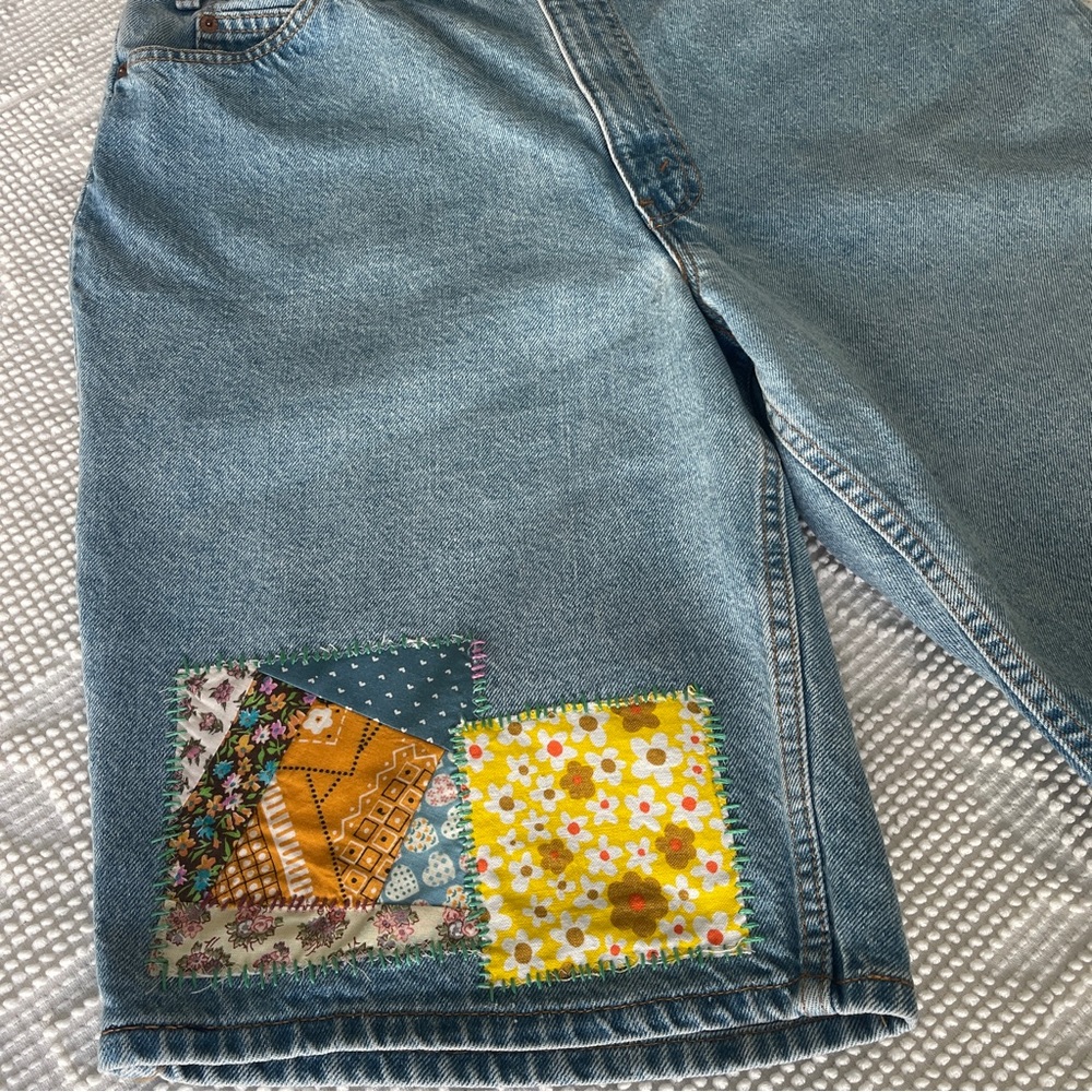 Vintage upcycled 560 Levi’s denim shorts, orange tab size 36